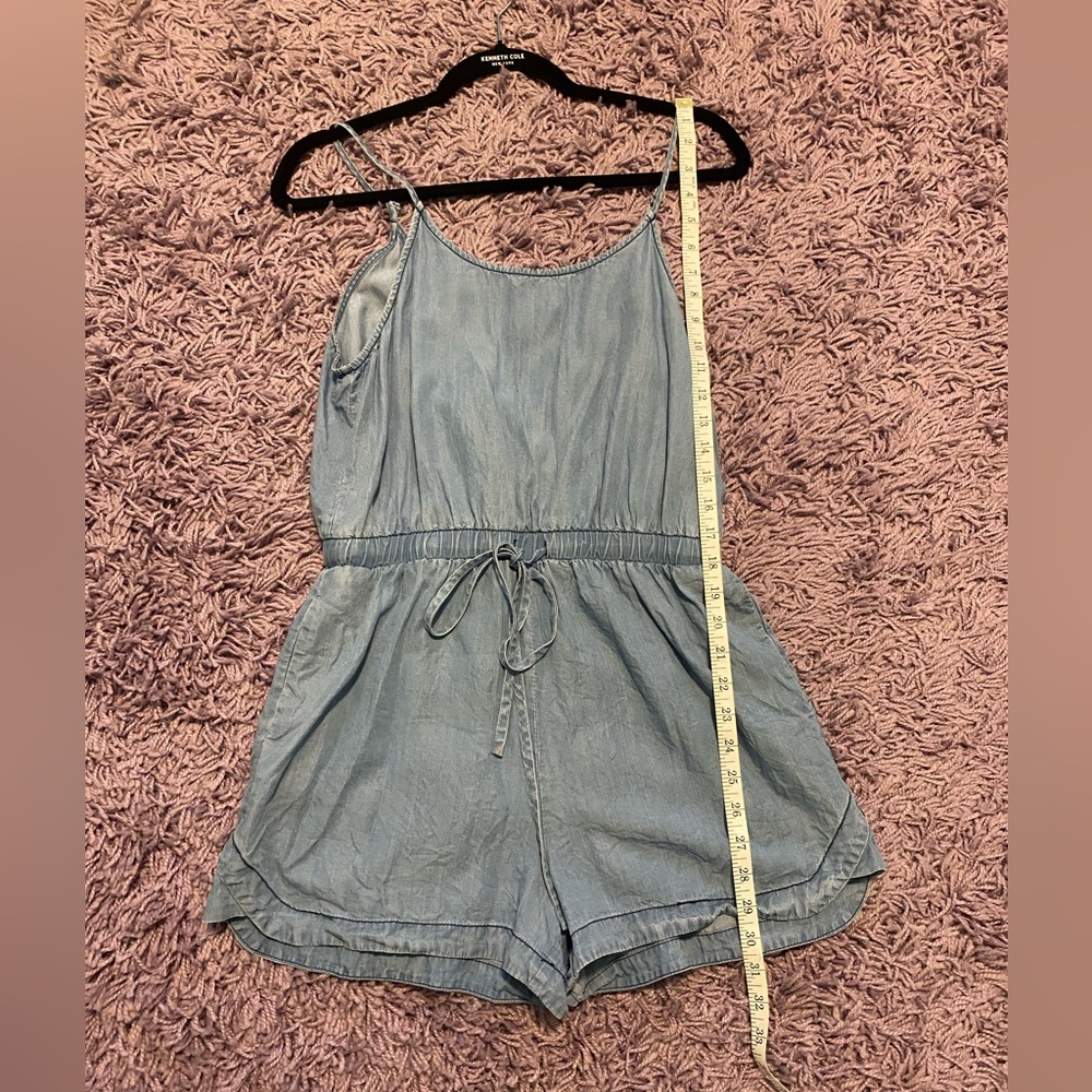 1250C Jean open back romper.